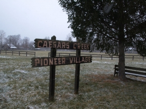 wooden sign in a grassy area